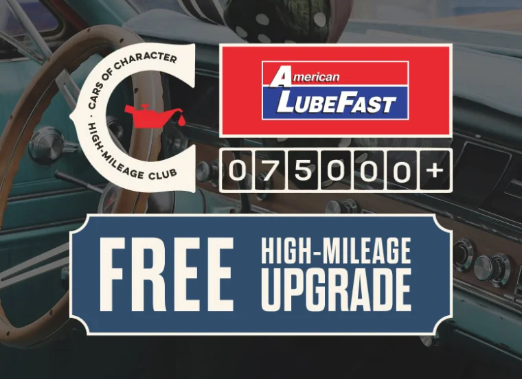 Dashboard of a classic car with text promoting a free high-mileage upgrade from American LubeFast for vehicles with over 75,000 miles.